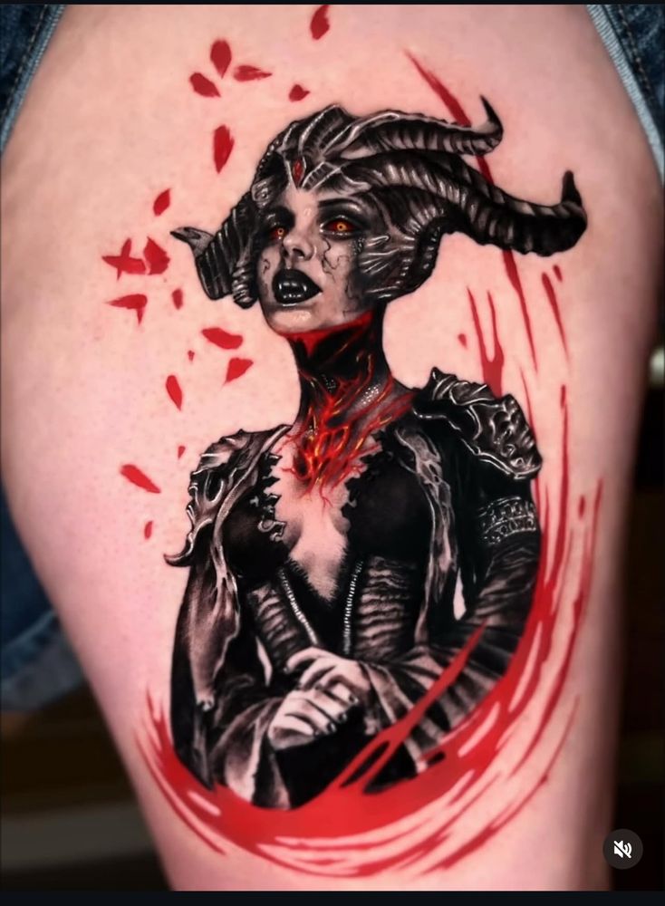 Tattoo of Lilith from Diablo 4. She has molten lava in her neck, blood rose petals around her, and blood splatter. She is black and grey.