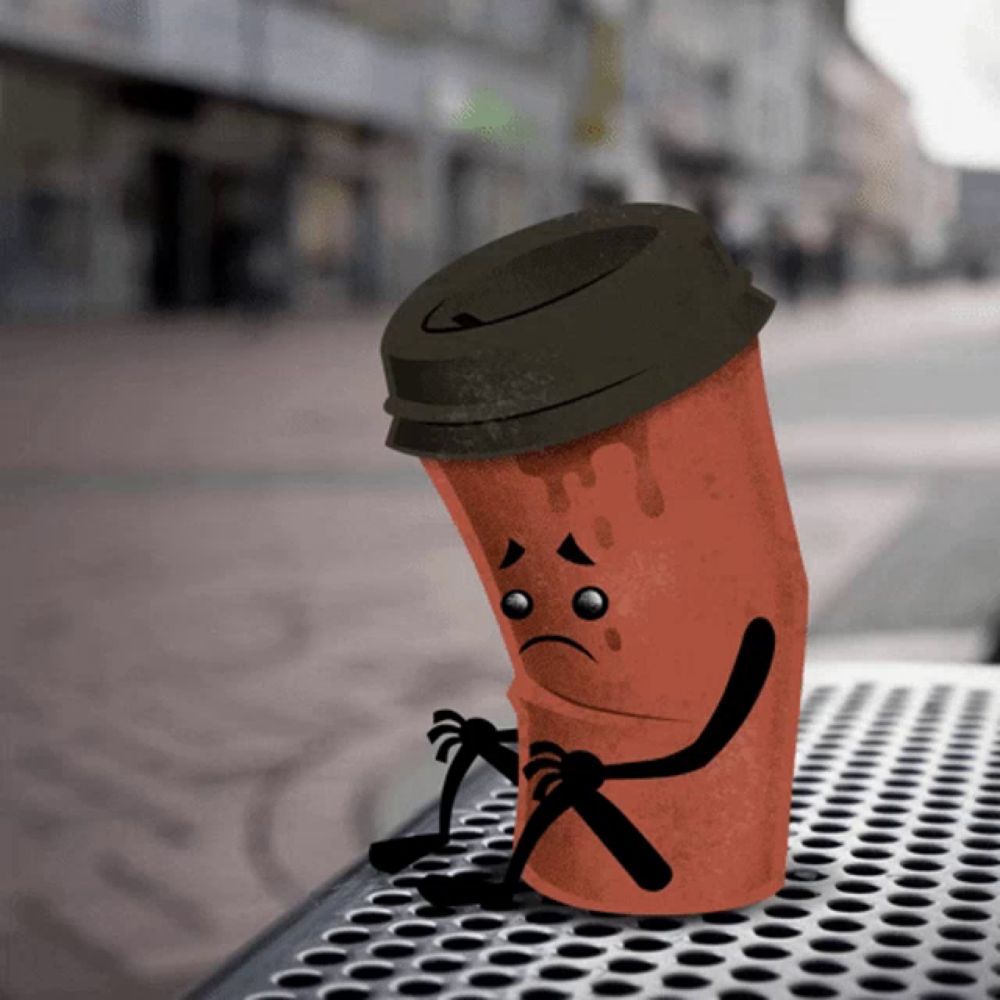 a cartoon drawing of a coffee cup with arms and legs