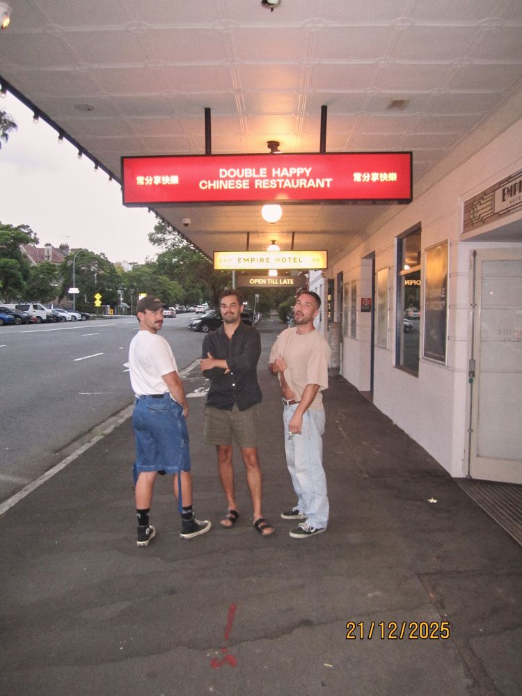 we’re outside the restaurant, im showing you how full my tummy is after dinner