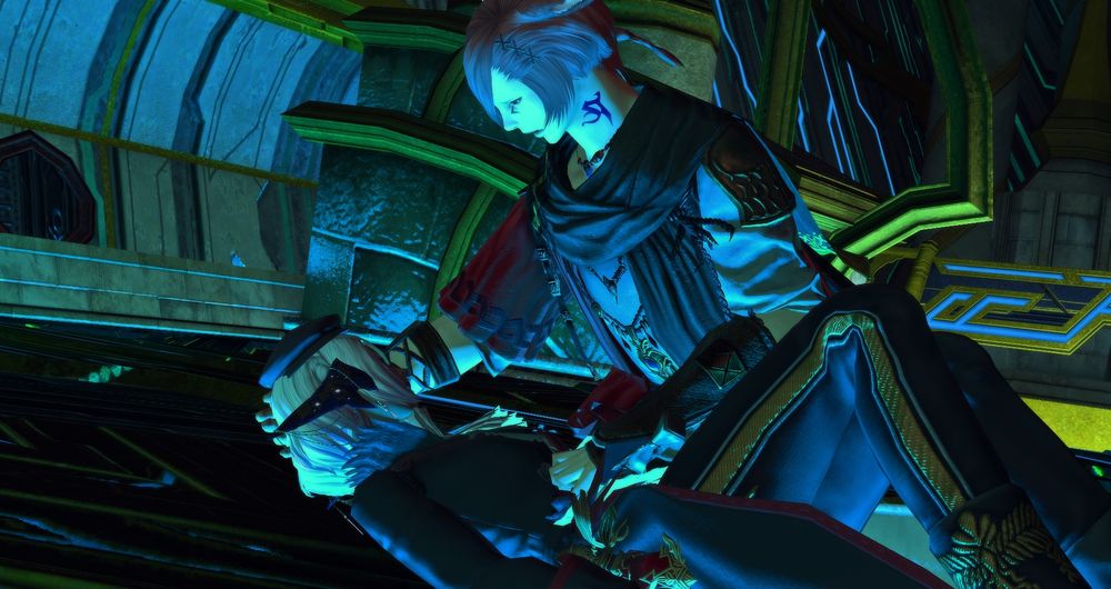 The shot shows a wider view of both G'raha and Tristall. She lays heavy in his arms, her head turned to the side, unseen by the camera.