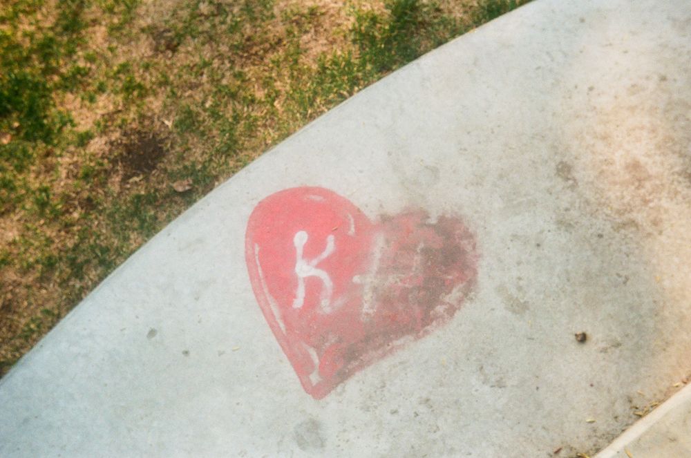 Graffiti of a heart: k & (redacted)