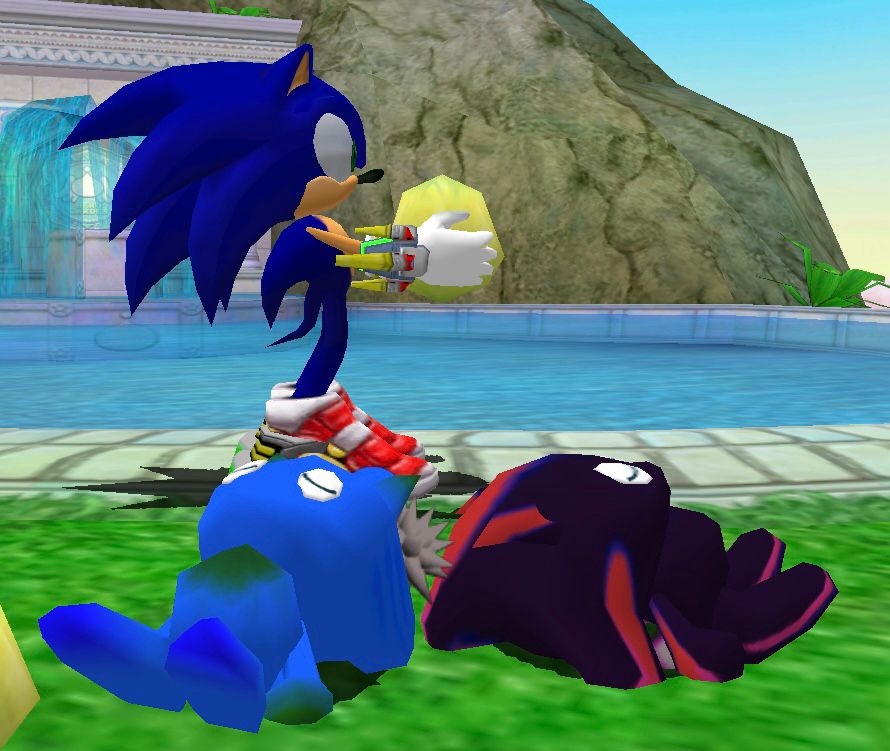 A closer look at my Sonic & Shadow chao sleeping next to each other.