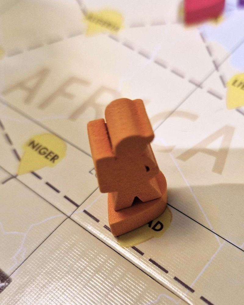 Atlas Explore the World close up wooden meeple