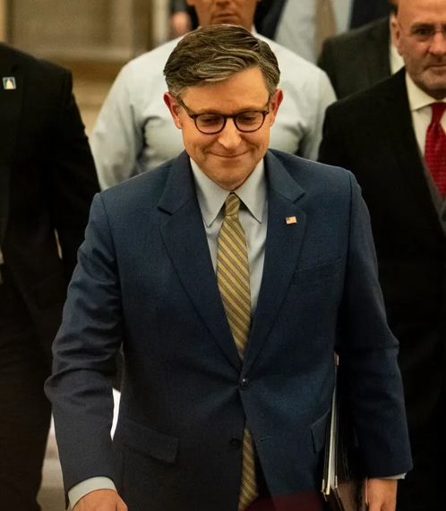 A picture of Mike Johnson smirking 