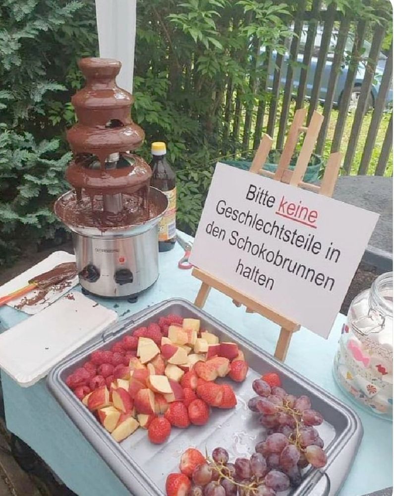 schokoladenbrunnen obst schild bitte keine geschlechtsteile in den schokobrunnen halten