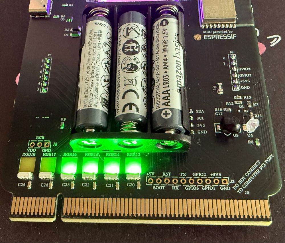 The backside of the NorthSec 2025 badge. It’s square and bottom fits into a PCI port. In the bottom left corner it’s labeled “Do not connect to computer PCI port”