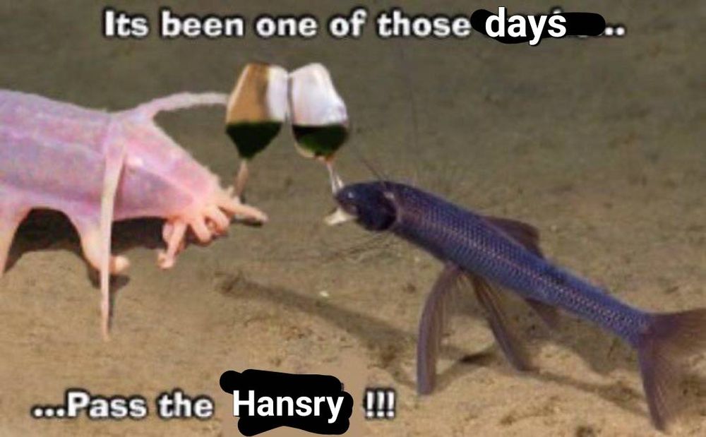 Two fish sit at the bottom of the sea clinking wine glasses. The text says, "It's been one of those days... Pass the Hansry !!!"