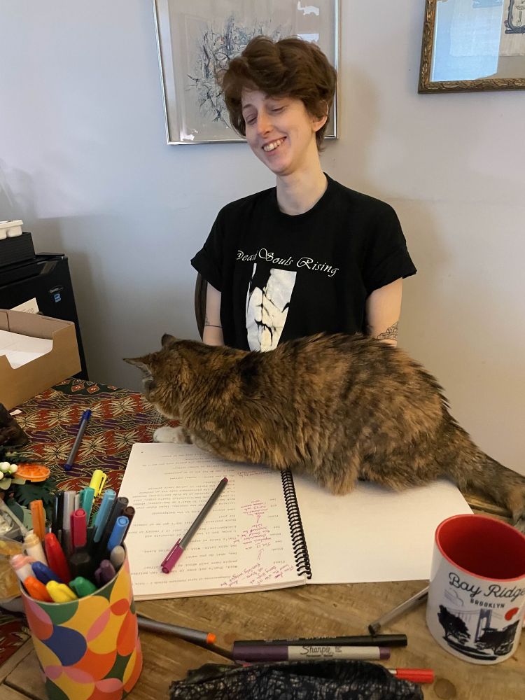 Director Sarah is unable to mark up Lydia scripts because the most beautiful cat in the world is sitting on them impolitely 