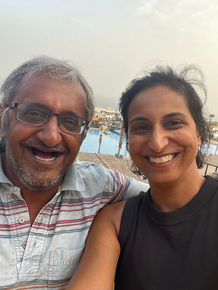 Picture of Sangeet and Devi smiling together on holiday
