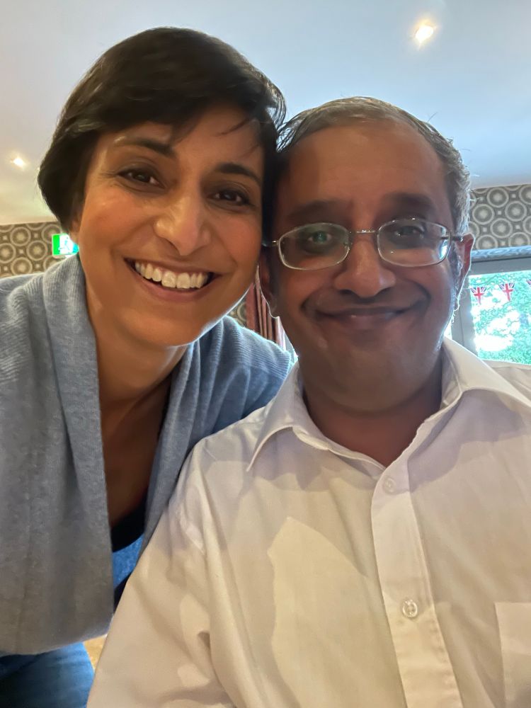 Picture of Devi and her brother Sangeet smiling together