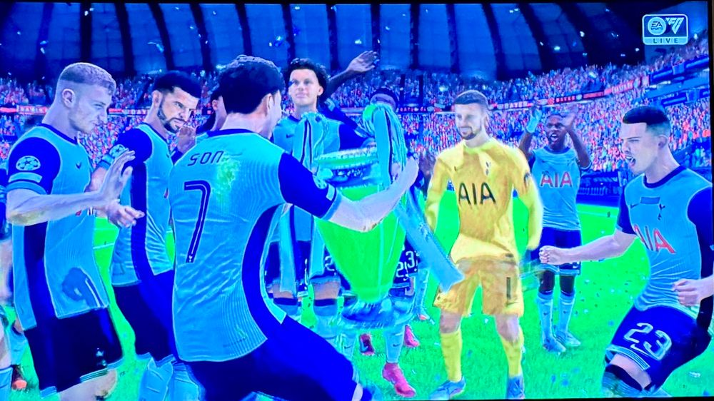 Video game Son Heung-Min lifting the UCL trophy with the lads
