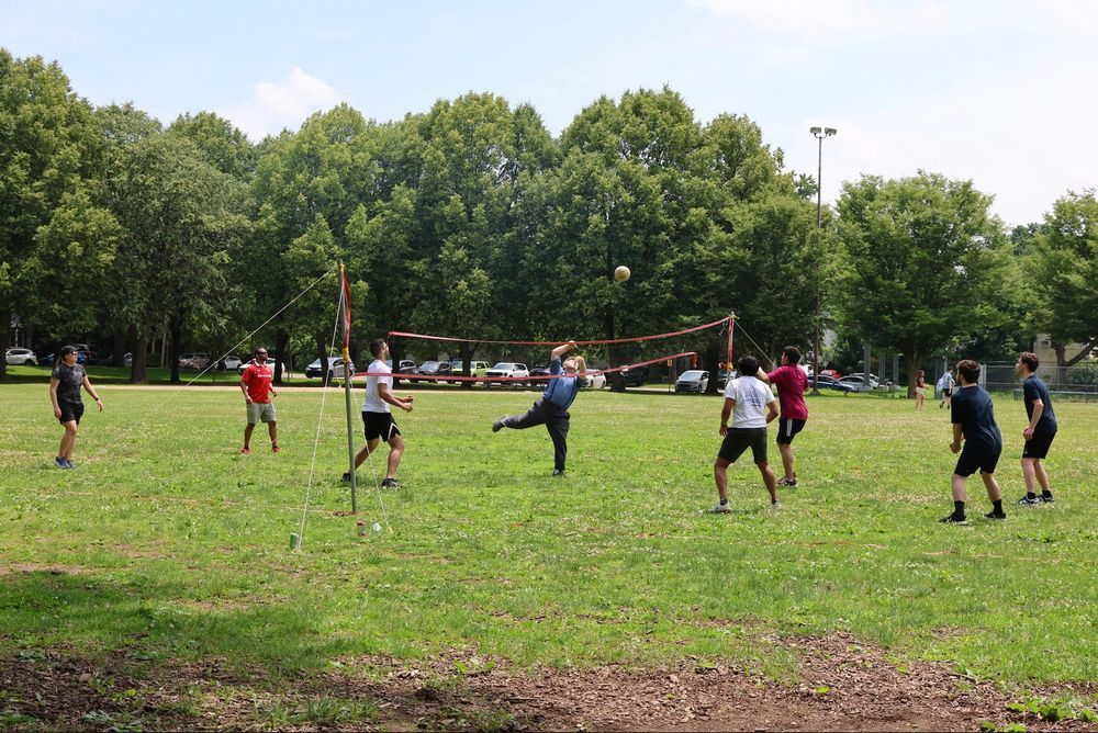 People playing volleyball.