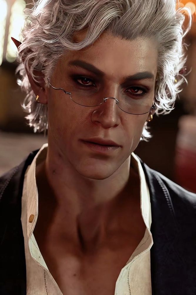 In-game photo of Astarion from BG3 in modern clothes and glasses. 