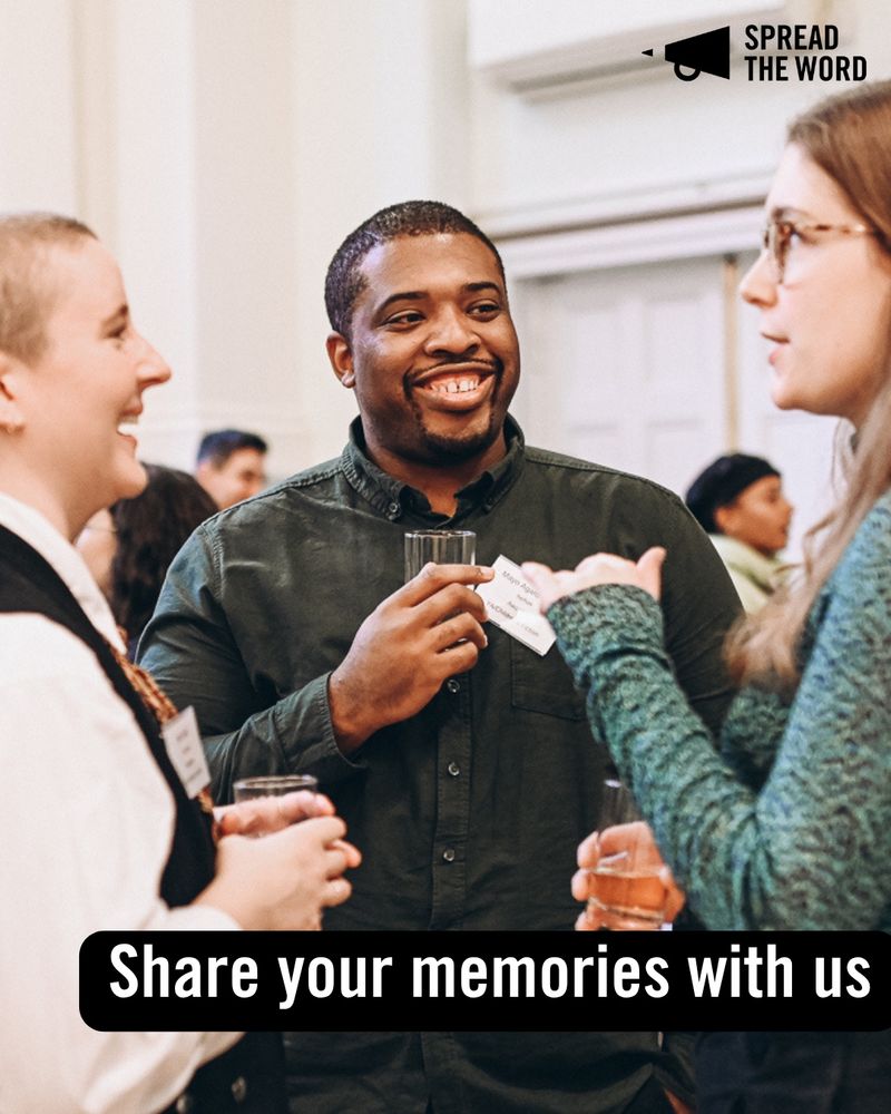 4. 3 people pictured holding drinks and laughing together at an event. There is a black man in the middle with a shaved head and gap between his front teeth, he is looking to a woman to the side of him who is talking. The other two people either side of him both of heir faces cut out. 
