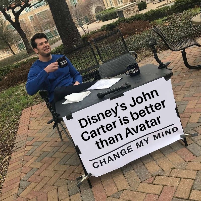 Meme of a guy sitting at a table, with a sign that says "Disney's John Carter is better than Avatar. Change my mind"