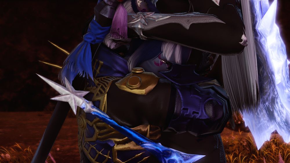 Closeup of Juksie holding Ysayle tightly as tears well in her eyes