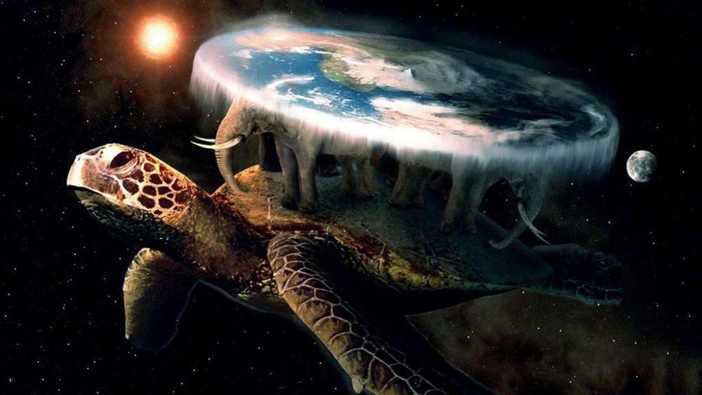 The star-turtle Great A'Tuin swims through space carrying the Discworld on its back supported by four elephants, with a tiny sun and moon orbiting it, in an illustration of Terry Pratchett's cosmology from his 'Discworld' novels