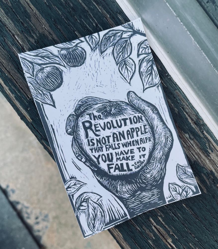 Wood print with text: The Revolution is not an apple that falls when ripe. You have to make it fall.  - Che Guevara