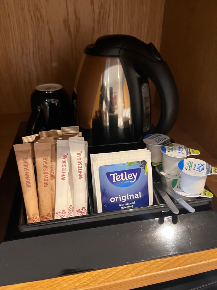 A tray with a kettle, Tetley original tea bags, sugar and milk