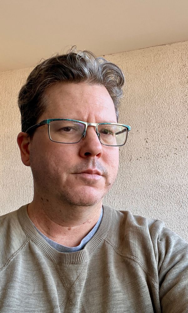 Selfie showing off short hair after years of wearing it long