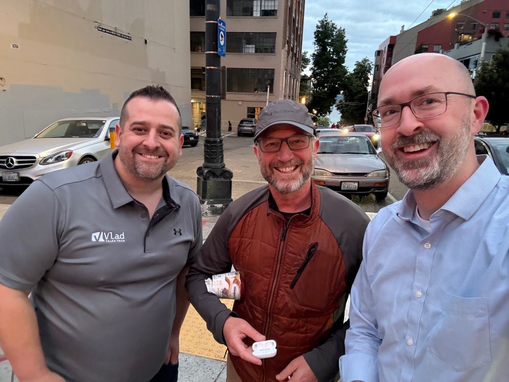 Running into friends on the Seattle streets, Vlad, Mark, and Andy. 