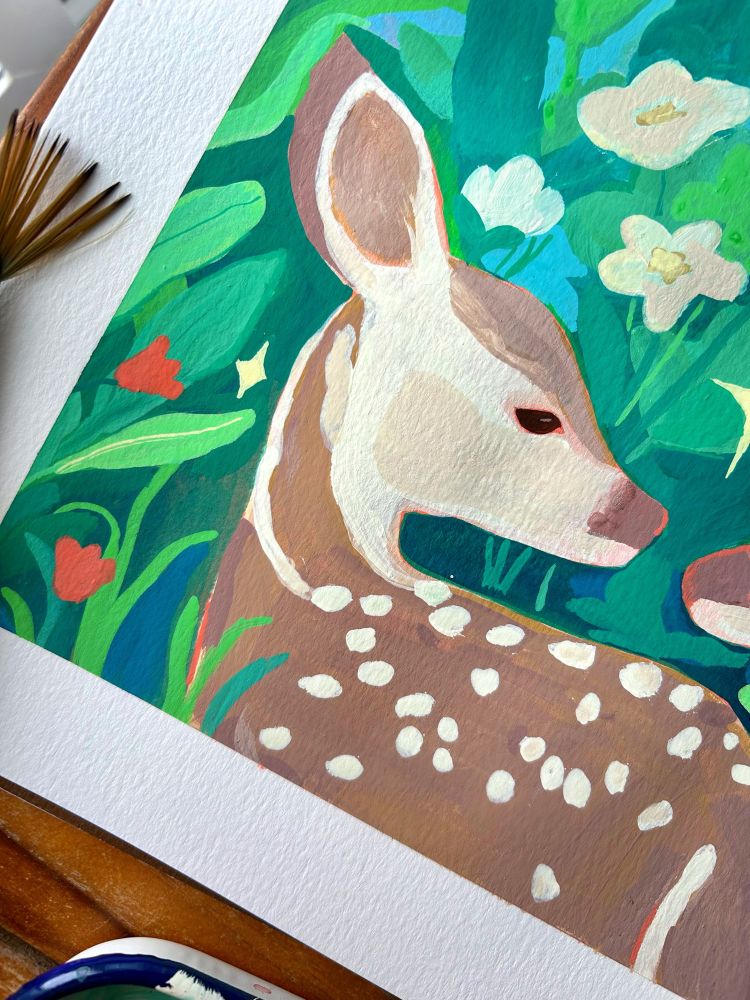 Close up of the brown baby deer where you can see the details a bit more