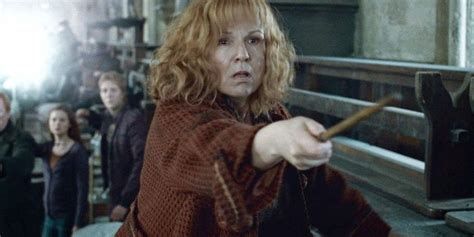 Molly Weasley, brandishing a wand.