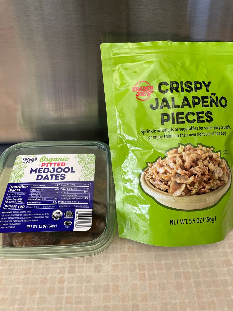 Box of dates and bag of crispy jalapeño  pieces.