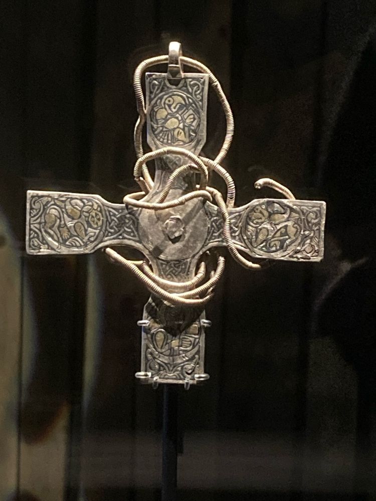 Silver cross decorated with pictures of the four evangelists 