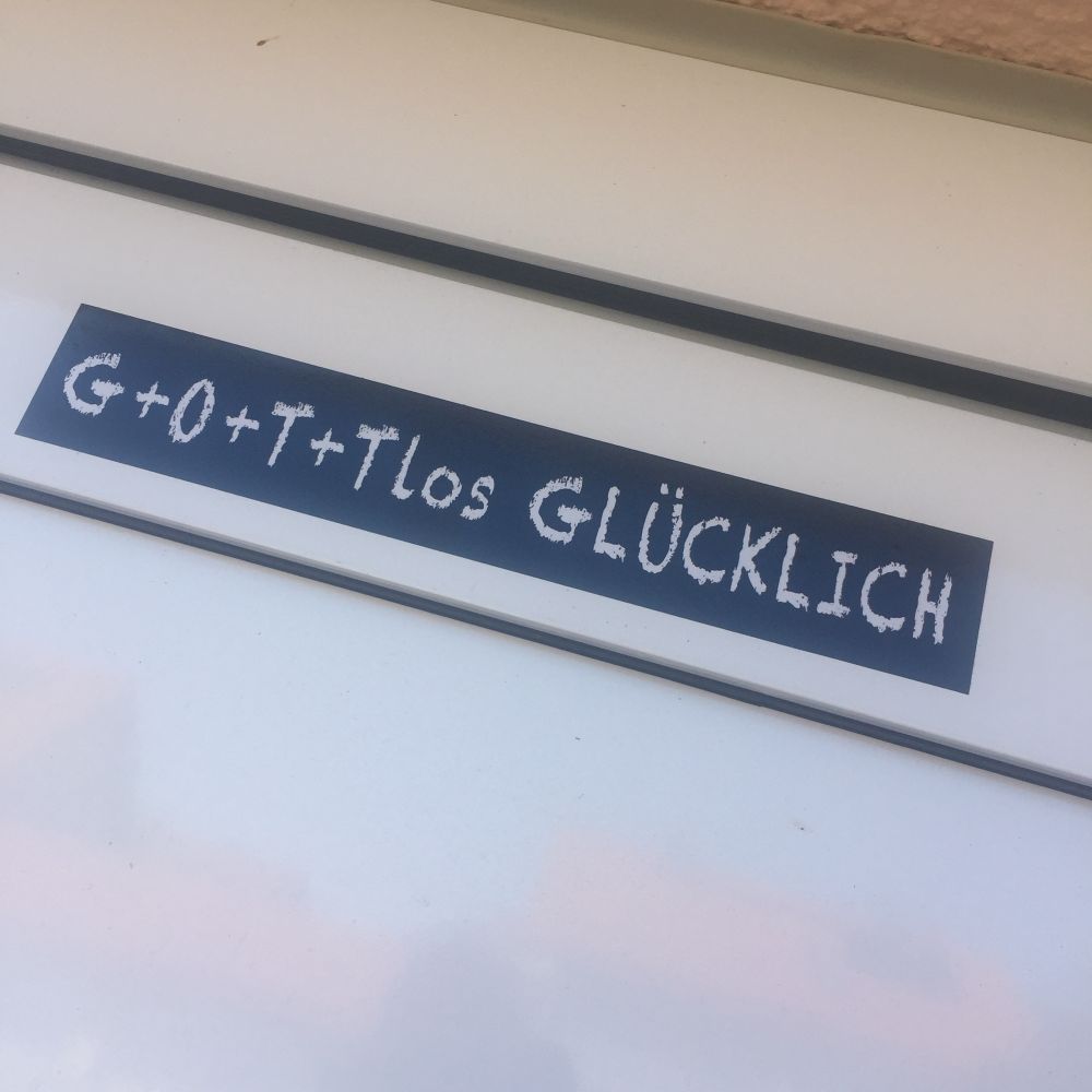 Aufkleber „gottlos glücklich“