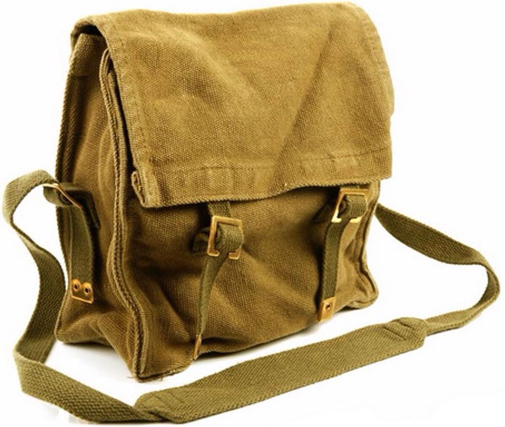 Canvas tas met bovenklep en schouderhengsel.
