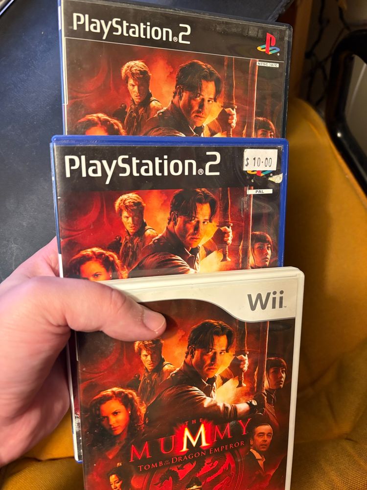 Three copies of The Mummy: Tomb of the Dragon Emperor
