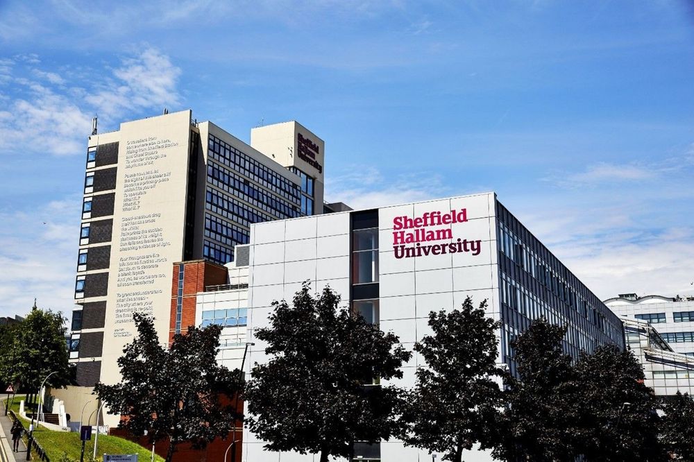 Buildings of Sheffield Hallam University with trees in front of them 