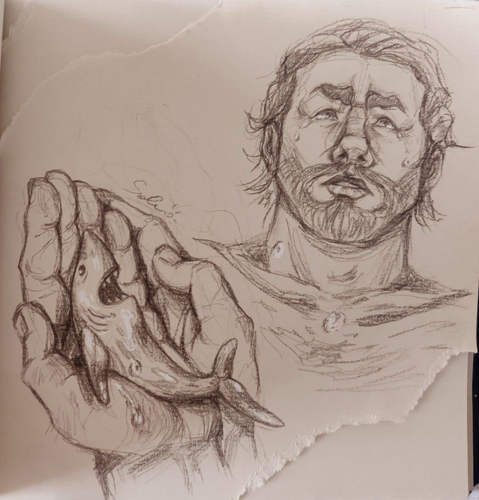 Closeups of Vander's hands cradling the shark carving and Vander's face, he's crying and some tears drop on his hand