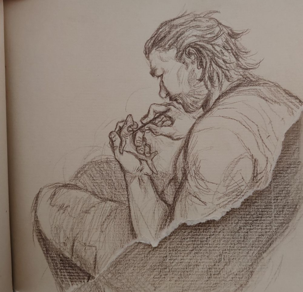 Vander from Arcane, sitting and carving a little shark.