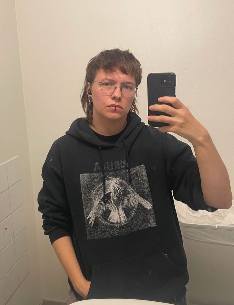 i’ve got brown hair in a mullet. the long hair in the back goes to about my shoulders and the short hair on top of my head goes to my eyebrows. i’ve got thin and flat hair.