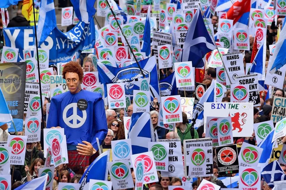 A No Nukes protest with CND and 'Bairns Not Bombs' placards to the fore