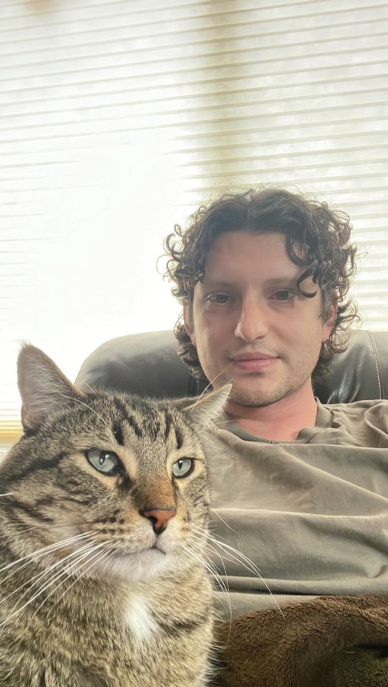 Me and my son a vocal tabby cat 