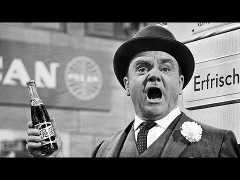 Jimmy Cagney holding a bottle of Pepsi