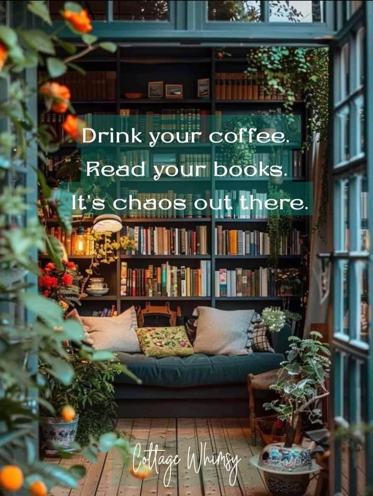 The image depicts a cozy and inviting reading nook, nestled within a charming, plant-filled space.  Dark teal built-in bookshelves are overflowing with books, creating a sense of scholarly comfort. A plush, dark teal daybed is positioned in front of the bookshelves, adorned with soft cushions.  Lush greenery, including potted plants and climbing vines, adds to the tranquil atmosphere.  The text overlay encourages a peaceful escape as it reads, "Drink your coffee. Read your books. It chaos out there," emphasizing the simple pleasures of reading and enjoying a warm drink. The overall aesthetic is one of calm, bookish contentment and a retreat into nature.
