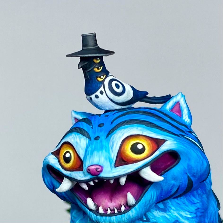 A close up of a miniature of Sussie and Derpy from Kpop Demon Hunters painted by me!