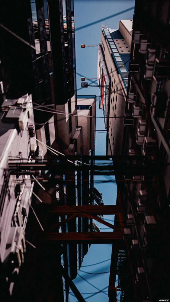 a view from street level of the section between two buildings, with cables and pipes hanging menacingly between them