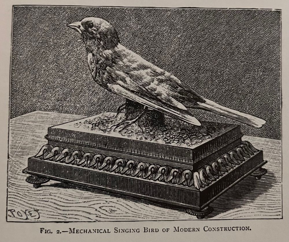 Diagram labeled “Mechanism of a Singing Bird,” depicting an intricate clockwork system with gears, levers, and labeled components powering a perched mechanical bird.