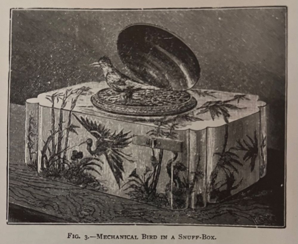 Engraving labeled “Mechanical Bird in a Snuff-Box,” showing a small bird rising from a decorative box with botanical motifs and an open lid.