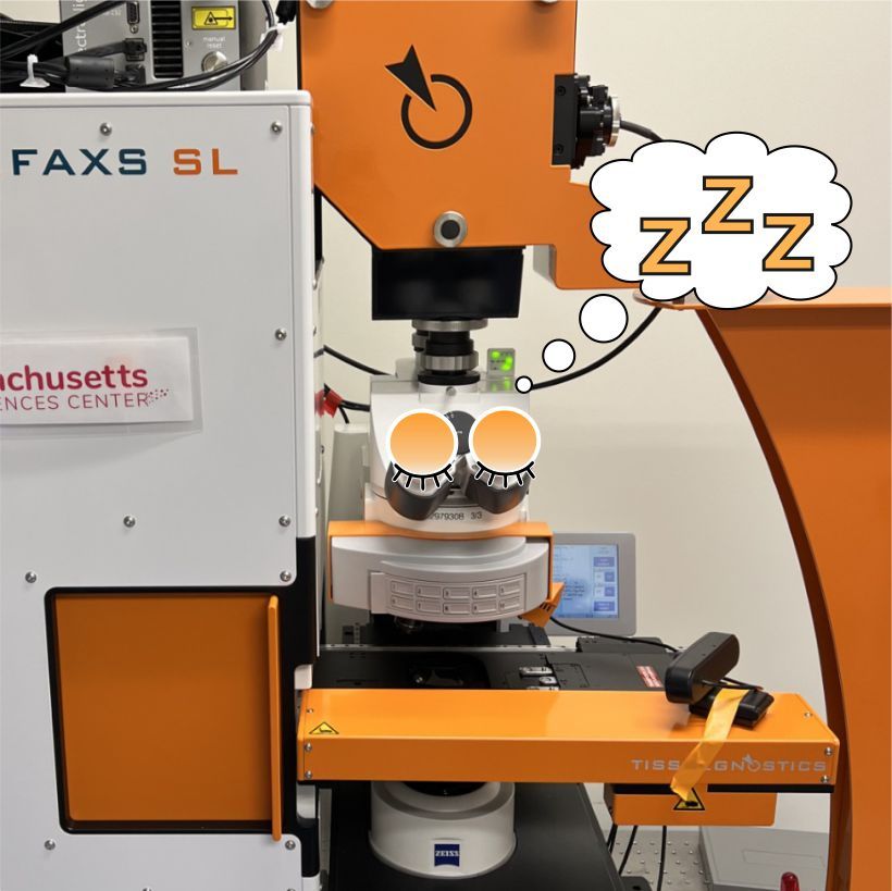 TissueGnostics Slide scanner instrument with cartoon closed eyes with a thought bubble filled with "z"s as if sleeping