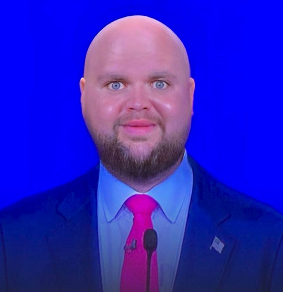 Photoshopped image of J.D. Vance against a high-saturation blue background