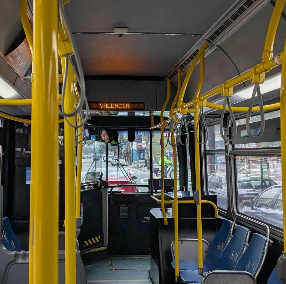 Looking forward in a bus toward a display reading "Valencia".