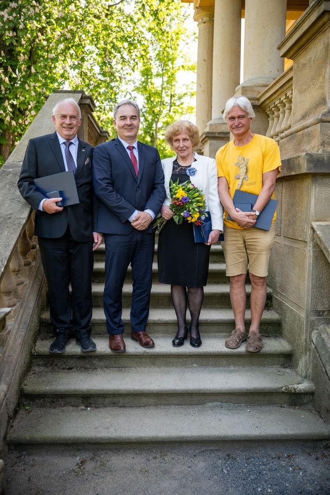 The awarded researchers with the President of the Czech Academy of Sciences. (Left to right: Ivo Šafařík, President of the CAS Radomír Pánek, Alice Valkárová, and Julius Lukeš).