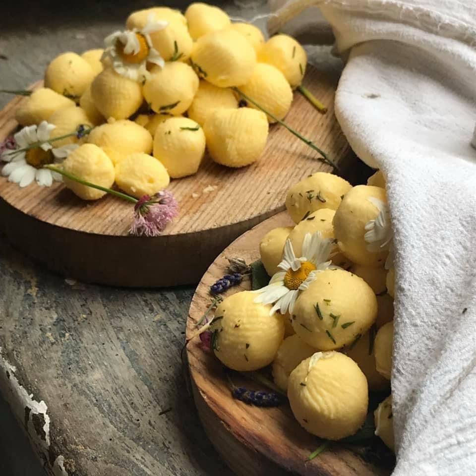 The final product. Butter balls to break the Lenten fast, for the gentry table. Decorated  with flower petals.