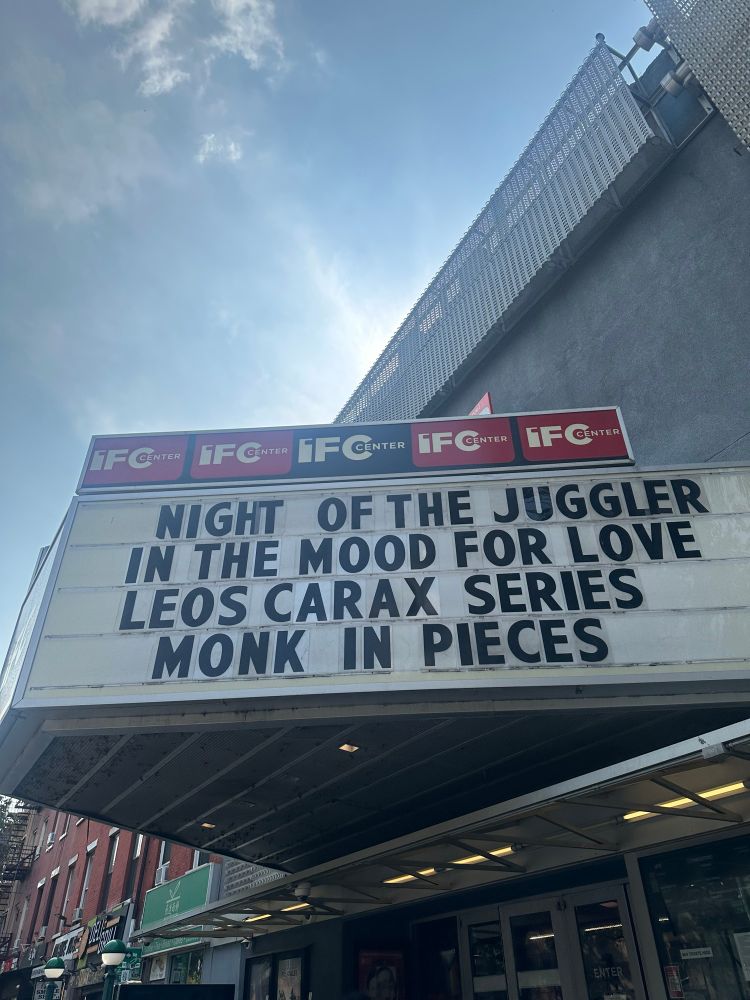 An IFC marquee showing NIGHT OF THE JUGGLER, IN THE MOOD FOR LOVE, LEO CARAX SERIES, and MONK IN PIECES